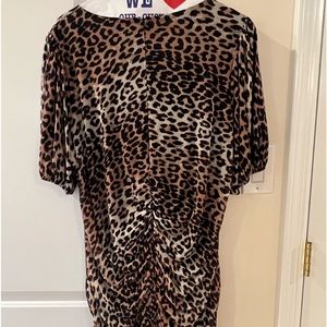 Women’s mini dress, and leopard made by Gianni